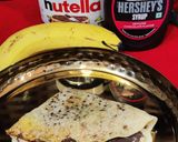 A picture of step 4 of Dosa with Chocolatey Nutella and ripe banana filling.