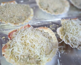 Foto del paso 6 de la receta: Vieiras rellenas de marisco y alcachofas