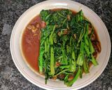 A picture of step 11 of Oyster Sauce Greens.