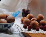 A picture of step 24 of Ricotta donut balls.