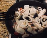 A picture of step 2 of Stir-fried squid with ginger, basil and chili 🦑.