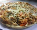Foto del paso 3 de la receta: Pizza de atún y queso