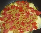 Foto del paso 3 de la receta: Filet de pescado con papas, tomate y fideo