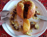 Foto del paso 3 de la receta: Manzana rellena de uvas pasas y polvo de nueces