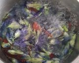 A picture of step 3 of Butterfly pea flower tea.