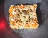 A picture of step 5 of Carrot toast with cheese spread.