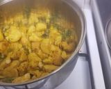 A picture of step 11 of Coconut spinach.