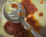 A picture of step 7 of Red sauce cheesy pasta.