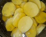 Foto del paso 1 de la receta Patatas confitadas al aroma de langostinos al ajillo