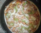 A picture of step 2 of Cheese pizza.