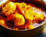A picture of step 5 of Chingri macher malai curry.