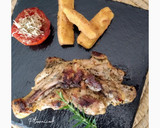 Foto del paso 9 de la receta: Pollo a la plancha con guarnición de tomate y calabacín rebozado