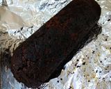 A picture of step 13 of Chocolate Swiss roll on pan.