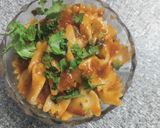 A picture of step 2 of Bowtie red jain sauce pasta.