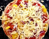 A picture of step 5 of My little Alfrado Pizza with 2 Cheese & Tomato 😘.
