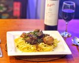 A picture of step 14 of Beef Bourguignon with Egg Fettuccine.