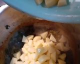A picture of step 2 of Alu meethi (fenugreek leaves).