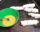 Foto del paso 3 de la receta: Salchichas con hojaldre en freidora de aire
