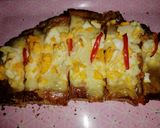 Foto del paso 3 de la receta: Pizza de Avena y harina integral con muzzarella, huevos y ajíes