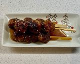 A picture of step 7 of Tsukune (Japanese style turkey meatballs).