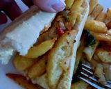 A picture of step 6 of MY Chilli Salt & Pepper Chips on a Baguette 😍.