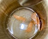A picture of step 1 of Ginger-Kissed Grapefruit Juice.