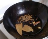 A picture of step 3 of Thor Muri Ghonto (Banana Stem cooked with Rice).