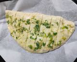 A picture of step 10 of Stuffed Garlic bread.