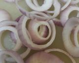 A picture of step 1 of Laccha Pyaz or Masala Pickled Onions.