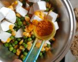 A picture of step 3 of Schezwan matar paneer corn masala.
