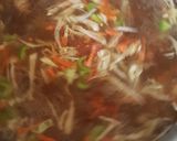 A picture of step 3 of Shangrila soup with bread sticks.