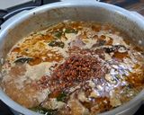 A picture of step 7 of Bhopali Red Rice Chicken Biryani.