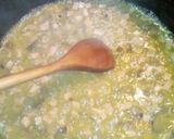Foto del passaggio 4 della ricetta Risotto ai funghi, piselli e prosciutto cotto