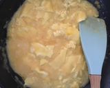 A picture of step 2 of Creamy and delicious scrambled eggs on toast.
