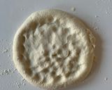 A picture of step 4 of Truffled Fontina and Mushroom Pizza.