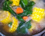 Foto langkah ke 3 dari resep Bening Daun Ubi Wortel Jagung.