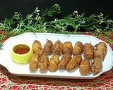 A picture of step 4 of Crispy Rava Nuggets Noddles Wrapped.