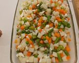 Foto del paso 6 de la receta: Ensaladilla con Calamar, infusión Marina y Piquillos al Ajillo