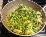 A picture of step 4 of Stir fried Cabbage, green peas, bok choy stuffed Pita bread.