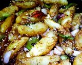 A picture of step 2 of Chilli garlic potatoes.