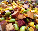 A picture of step 6 of Savory Braised Tofu with Edamame and Corn.