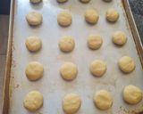 A picture of step 5 of Jam Thumbprint Cookies.