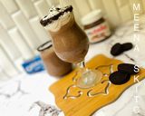 A picture of step 6 of Oreo and Nutella milkshake.