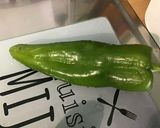 Une image de l'étape 6 de Aubergine italienne farcie au poulet haché et poivron vert.