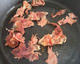 Foto del paso 4 de la receta: Nido de patatas paja con huevos de codorniz y crujiente de jamón