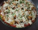 A picture of step 5 of Pizza rice.