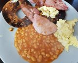 A picture of step 4 of My Buttered toasted Bagel with Bacon,scrambled Egg + Beans. 💖.