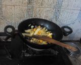 A picture of step 6 of Kumro shaak with chingri mach and dal a tasty lunch.