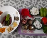 A picture of step 4 of Stuffed capsicums and tomatoes.