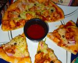 A picture of step 12 of Chicken spicy pizza.